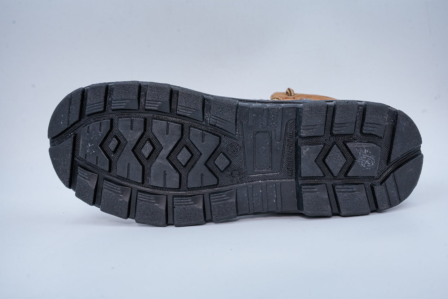 Upper – Brown suede leather