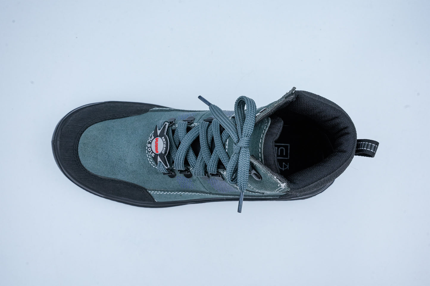 Upper – Green and black suede leather