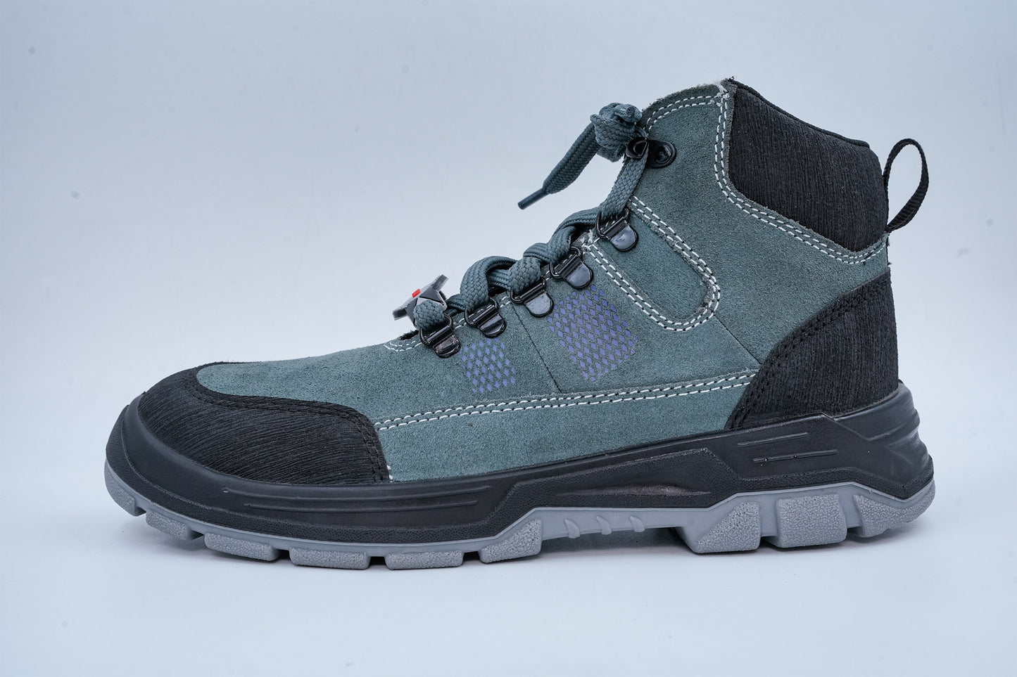 Upper – Green and black suede leather