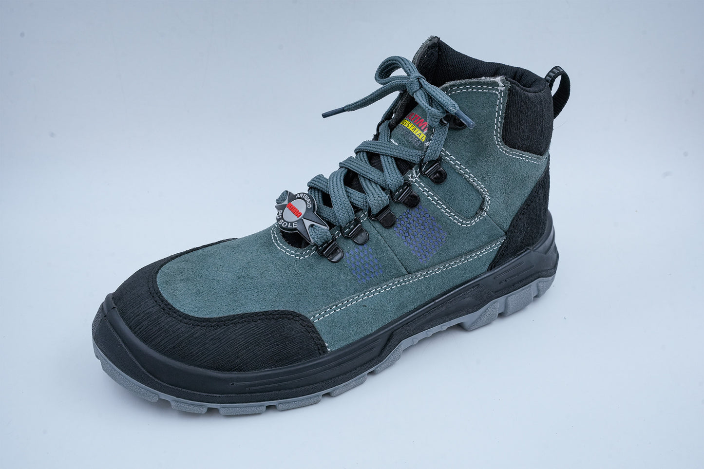 Upper – Green and black suede leather