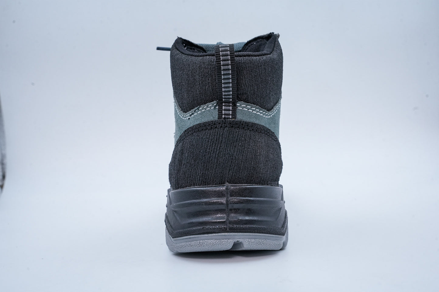 Upper – Green and black suede leather